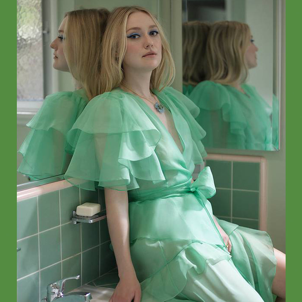 dakota fanning green dress Dakota Fanning embraced the green theme in her floor length olive gown for the premiere of her new thriller movie The Watchers | HELLO!
