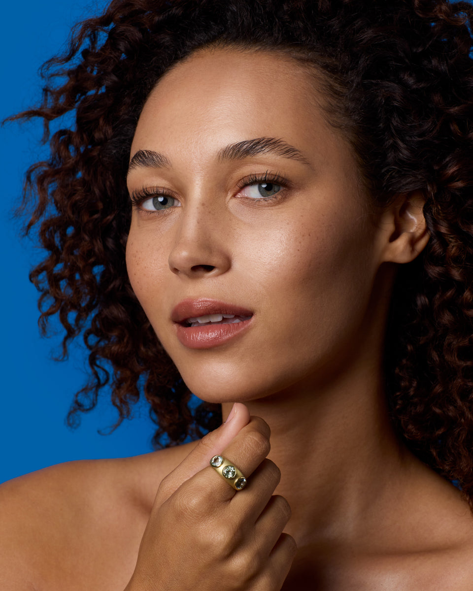 One of a Kind Round Three Stone Gemmy Puffed Gold Ring